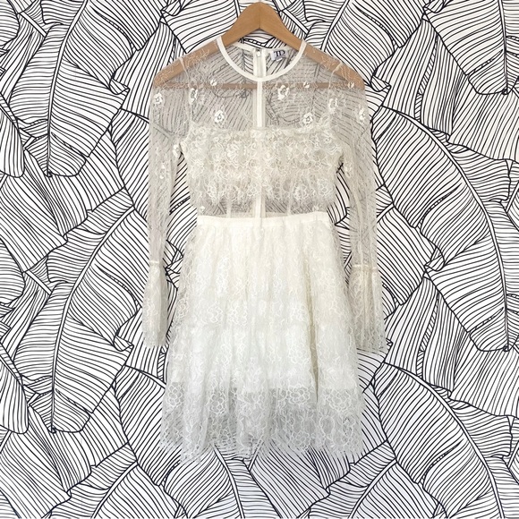 True Decadance Dresses & Skirts - True Decadence White Lace Ruffle Mini Dress